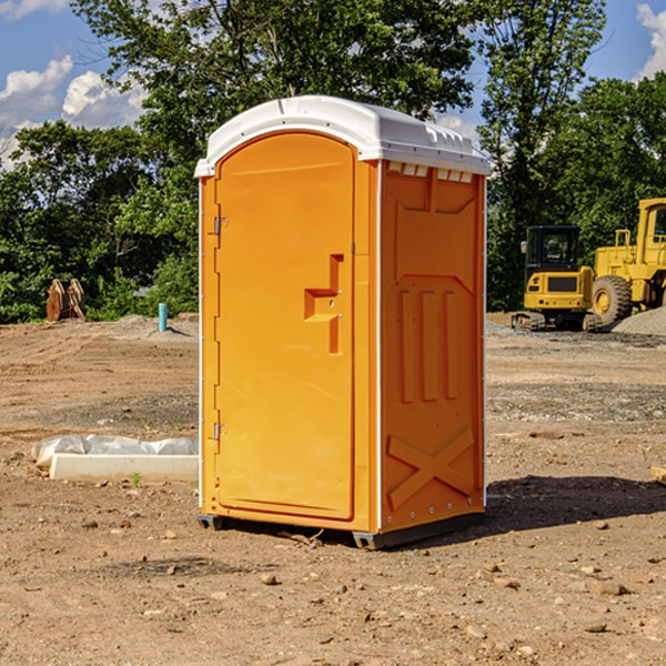 how often are the portable restrooms cleaned and serviced during a rental period in Long Lake